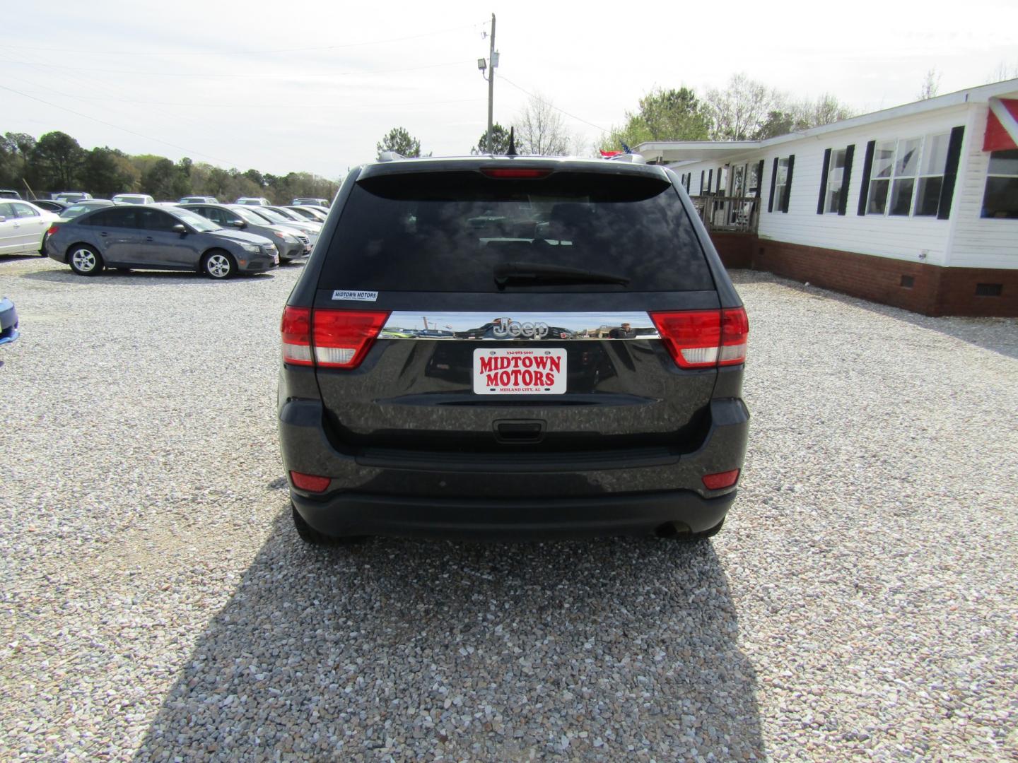 2013 Blue /Gray Jeep Grand Cherokee Laredo 2WD (1C4RJEAG0DC) with an 3.6L V6 DOHC 24V engine, Automatic transmission, located at 15016 S Hwy 231, Midland City, AL, 36350, (334) 983-3001, 31.306210, -85.495277 - Photo#7